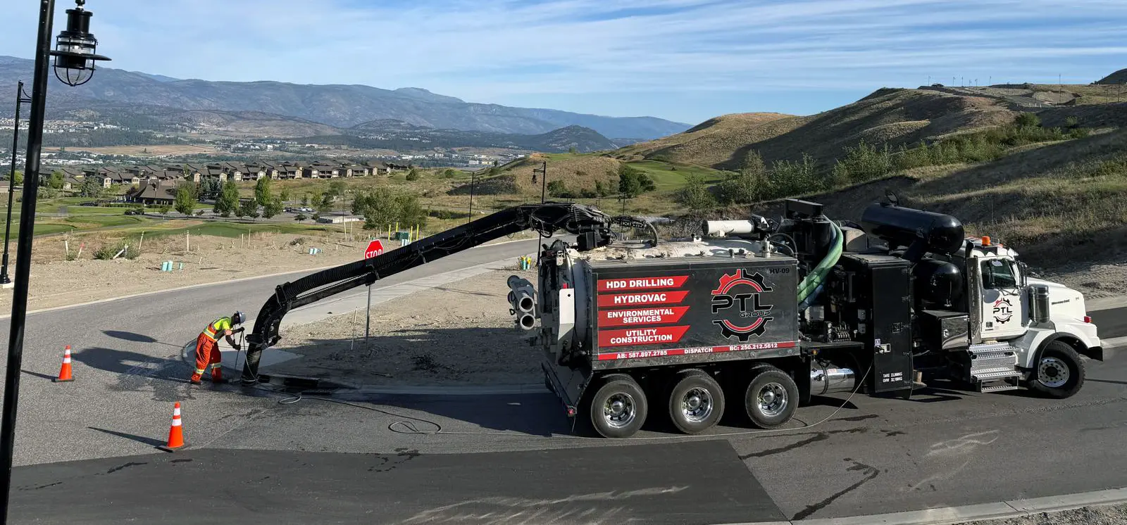 High-capacity 14-yard tri-axle hydrovac truck providing non-destructive daylighting and utility asset verification services in British Columbia.
